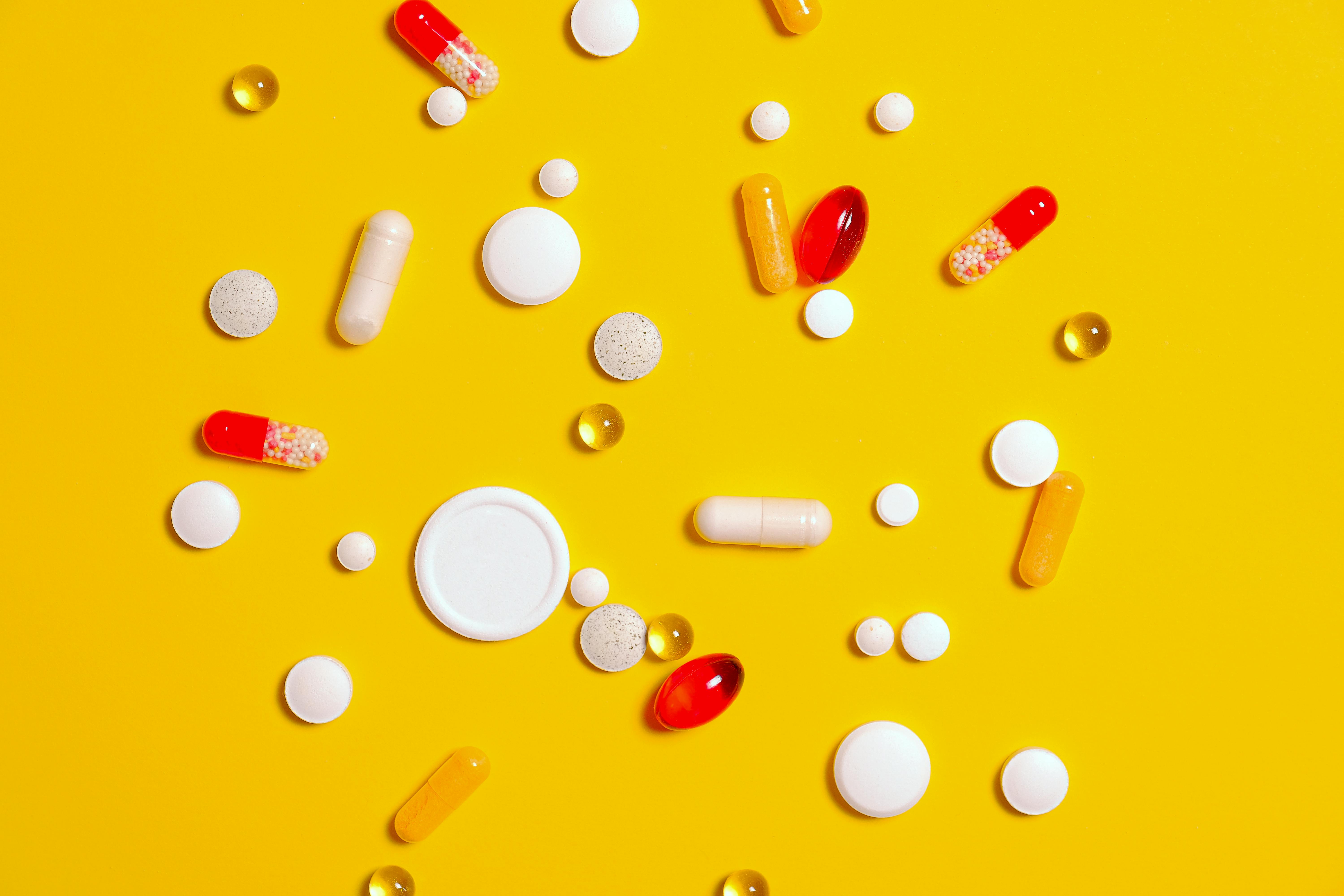 Supplements on a yellow background