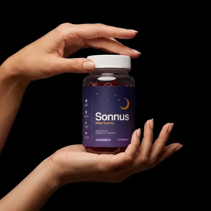 Hand holding a Sonnus&reg; Sleep Gummy bottle